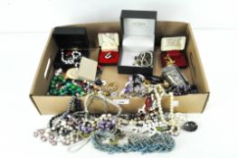 A selection of costume jewellery, including necklaces, pendants,