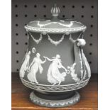 A Wedgwood dipped green, 'Dancing Hours' jasperware biscuit barrel and cover,