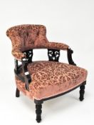A Victorian mahogany nursing chair,