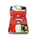 A cased set of vintage Lego, in assorted colours and shapes,