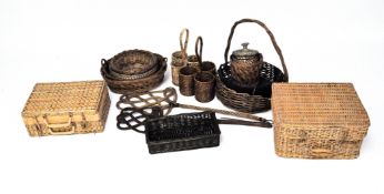 A large selection of vintage wicker baskets, of varying shapes and designs,