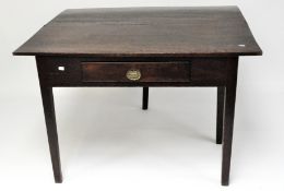 A 19th century mahogany folding table, a drawer with a brass handle beneath,