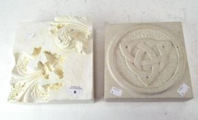 A carved limestone block with an encircled symbol to the centre, 5cm x 20cm x 20cm,