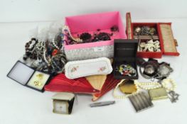 A selection of costume jewellery, a Kigu compact and other items