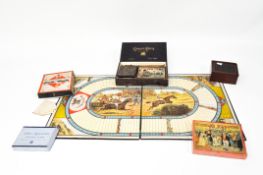 A selection of vintage board games including The Game of the Race, Winkle's Wedding,