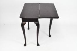 A card table with folding top, on cabriole legs, folded 72cm x 70cm x 34cm,