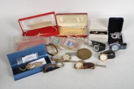 A collection of 20th century watches and necklaces, including two pearl necklaces,