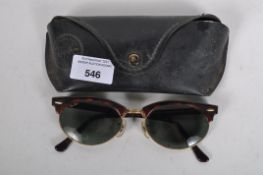 A pair of vintage Bausch and Lomb Rayban sunglasses