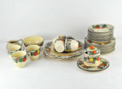 A part Staffordshire 'Pomme D'Or' pattern tea set decorated with colourful fruits