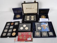 A selection of cupro-nickel plated coin sets,