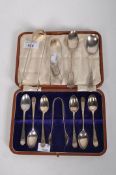 A set of five George V silver teaspoons and a pair of sugar tongs and more