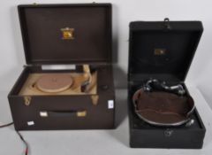 A 'His Master's Voice' portable gramophone together with a similar example