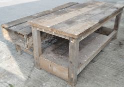 Two vintage wooden work benches, of plank construction,