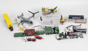 A large quantity of military diecast and hand made models including helicopters, aircraft,