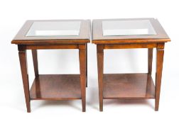 Two modern glass top square side tables with lower shelf,