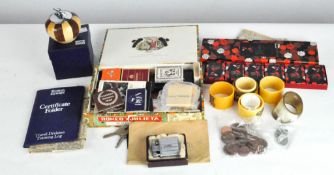 A Ronson 'Carousel' table lighter, in the original box and other items