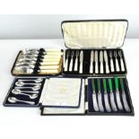 A collection of silver plated flatware,
