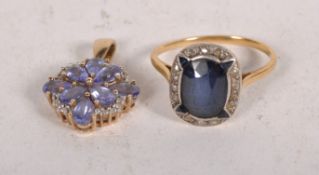 A blue and white stone set ring and a 9ct gold and tanzanite pendant in the shape of a flower