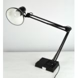 A vintage anglepoise style desk lamp, black painted frame with enamel shade,