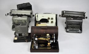 Two vintage 66 Imperial typewriters, 51cm wide, together with a vintage Singer sewing machine,