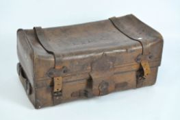 An early 20th century leather bound trunk,