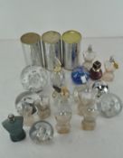 A collection of paperweights and scent bottles, the weights with assorted bubble inclusions,