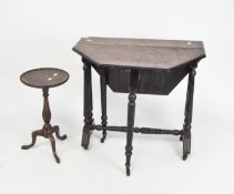 A 19th century drop leaf occasional table of octagonal form,