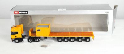 A WSI Model model No. 04-1180 WSI Yellow Line Scania Streamline Topline 6x4 with Ballast Trailer