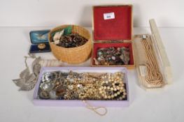 A quantity of costume jewellery, comprising brooches, earrings, buckles, strings of pearls,