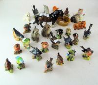 A collection of Beswick birds, cats, a pony and Ribby