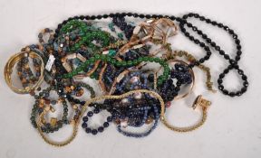 A collection of costume jewellery, including lapis, green,