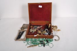 A wooden canteen containing a variety of collectable's, including a propelling pencil, jewellery,
