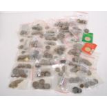 A large collection of coins, from worldwide locations including Burma, Spain, Portugal and Africa,