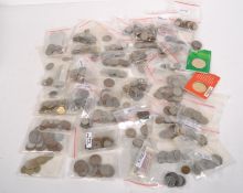 A large collection of coins, from worldwide locations including Burma, Spain, Portugal and Africa,