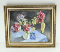 A oil on board still life of a jug of flowers, signed (lower right) 'Jean Kent', framed,