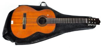 A Yamaha G-230 acoustic guitar, height 100cm,