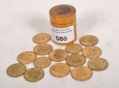 Thirteen Victorian gaming tokens, including examples marked for Robert Holt, Crystal Palace,