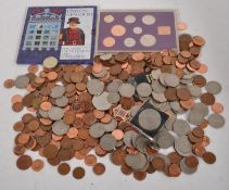 A collection of coins, mostly copper 1ps and 2ps,