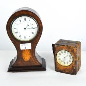 A vintage Solus electric travel clock together with an inlaid mantel clock