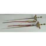 Two reproduction dress swords, each with jewelled metal handle,