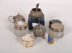 Two silver capped glass pots; a modern silver box and cover and more