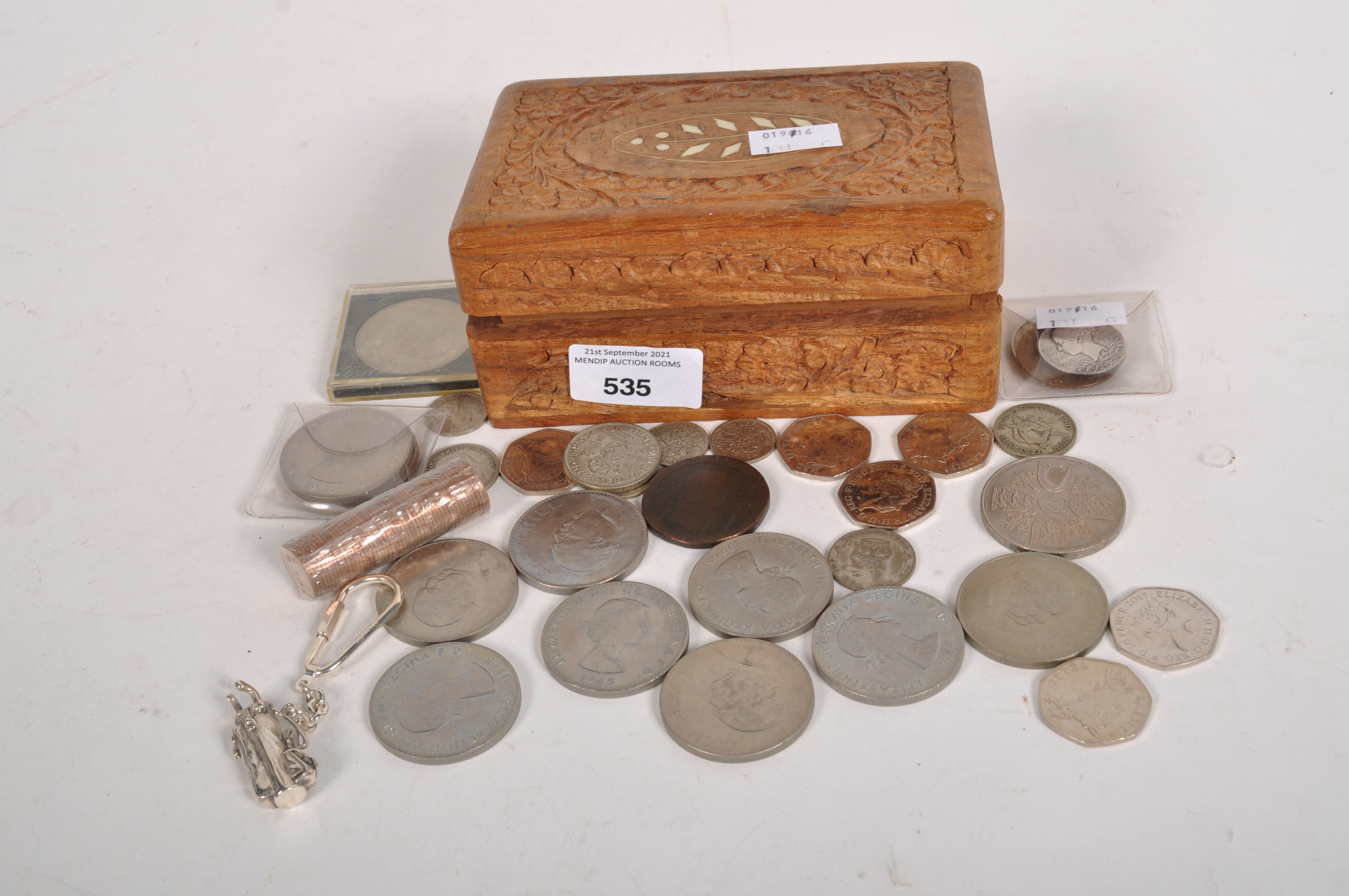 A group of coins, including a collection of Churchill 1965 crowns, fifty pence pieces,