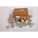 A group of coins, including a collection of Churchill 1965 crowns, fifty pence pieces,