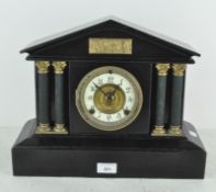 An American cast iron mantel clock with black finish, circa 1905, model 'Capri',