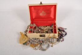 A parcel of costume jewellery including necklaces, rings, watch and other items,