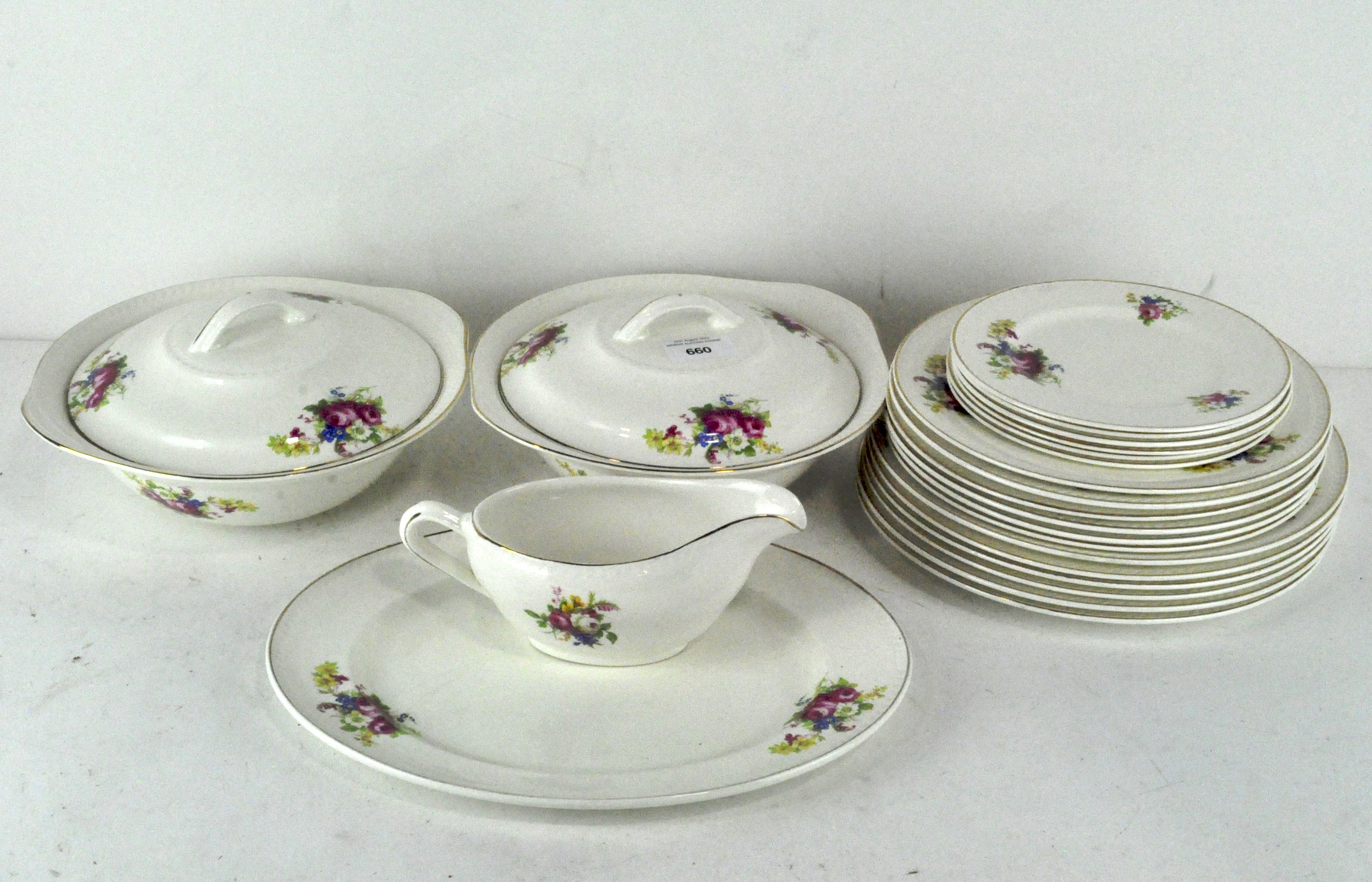 A Portland Pottery part dinner service, 6/1956, decorated with floral printed decoration of flowers,