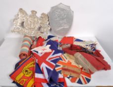 A string of vintage bunting, some commemorating the Silver Jubilee,