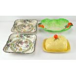 A pair of Royal Doulton plates with a Beswick 'lettuce and tomato' dish and a Devon cheese dish