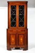 A Sheraton style mahogany corner cabinet,