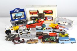 A collection of diecast together with play worn vehicles by Britains, Dinky and Matchbox